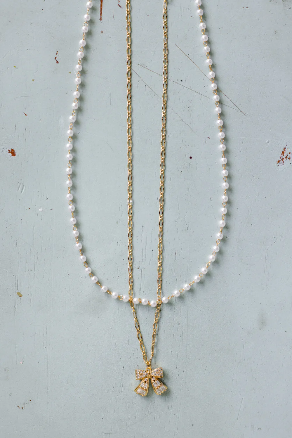 Bow Necklace in Gold | N7992G