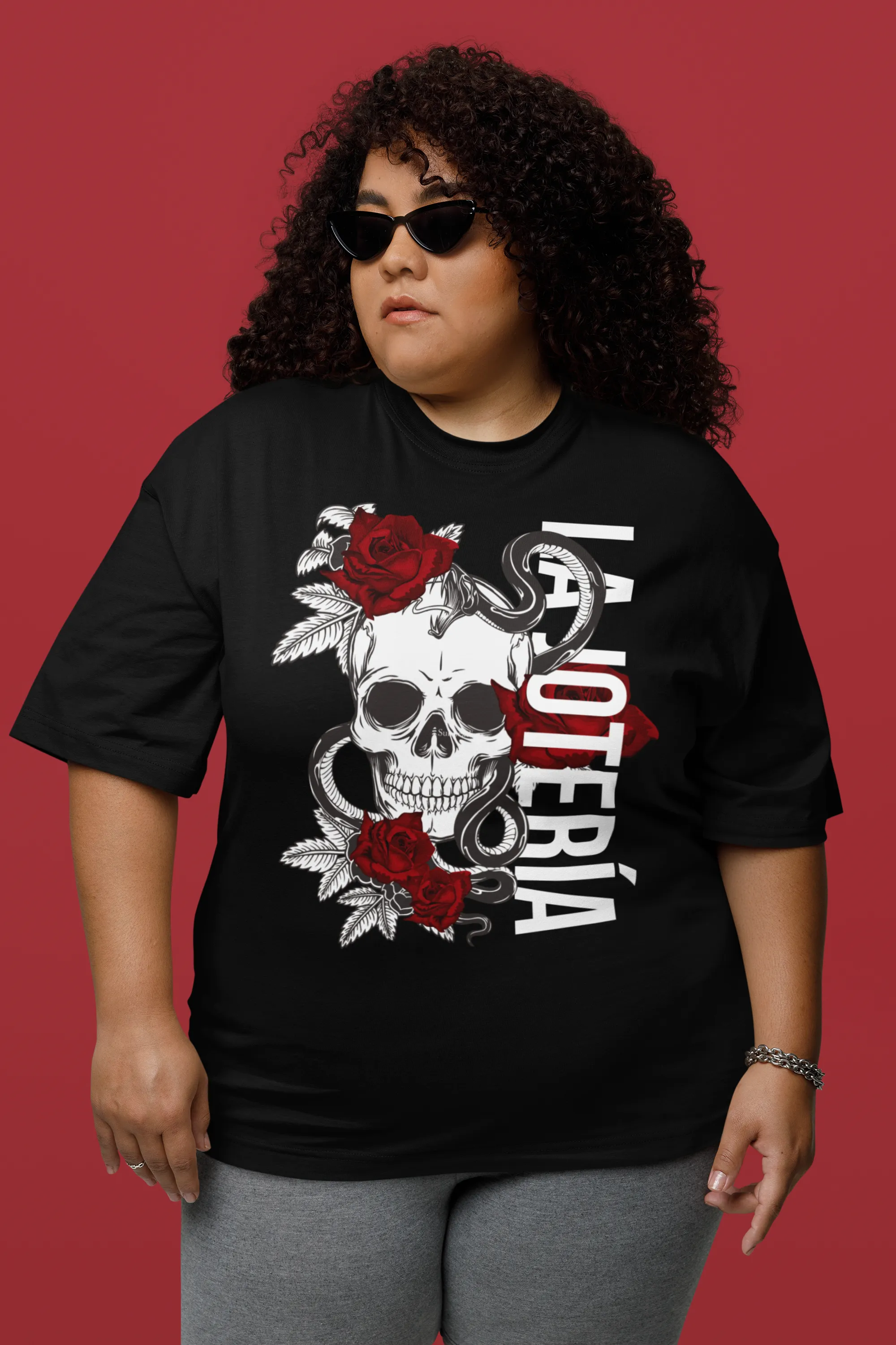 La Jotería Reclaimed for Pride and Resistance Latino Streetwear on front of Black Oversize Deep Drop Shoulder Tee - 190 GSM