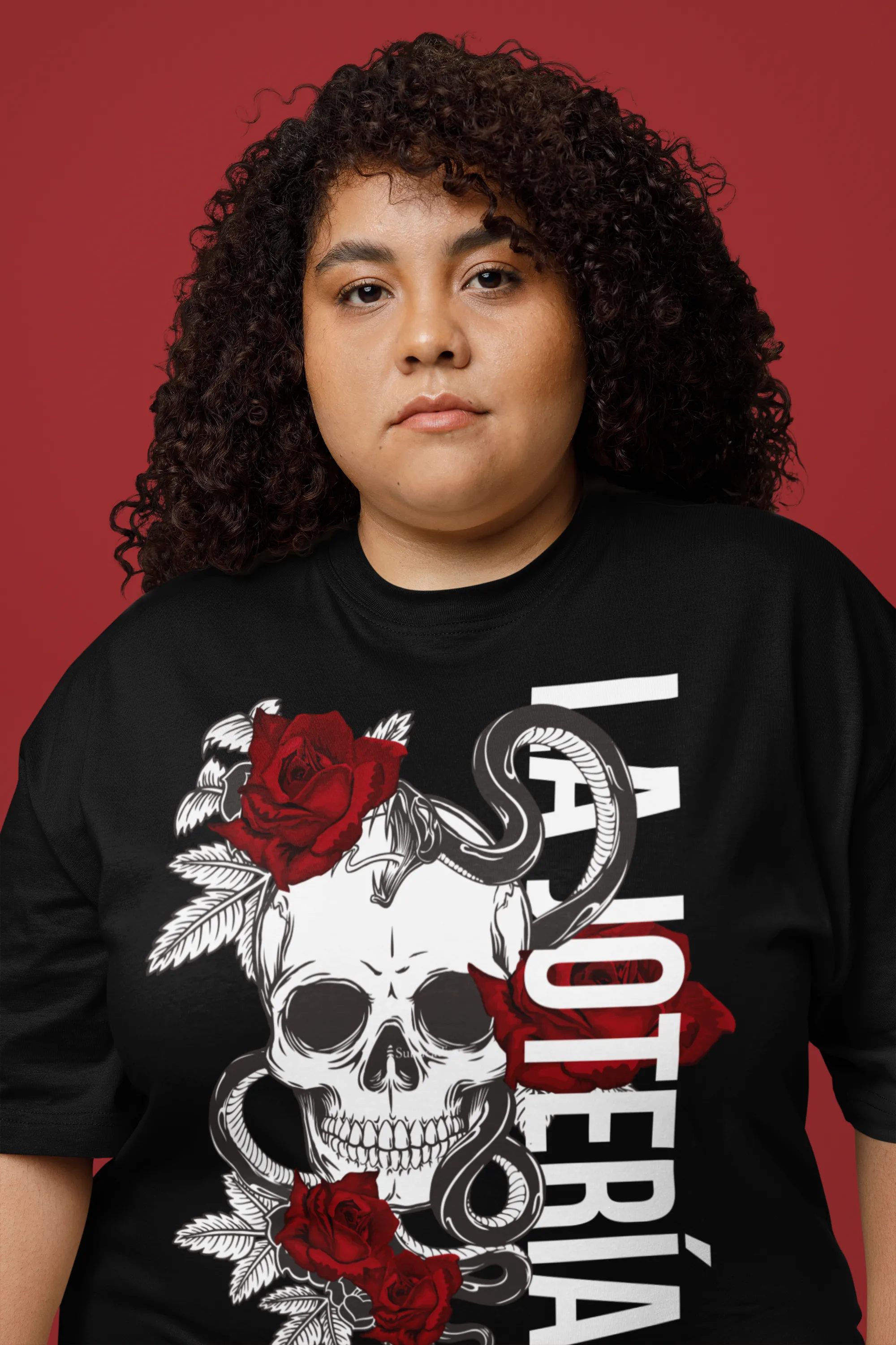 La Jotería Reclaimed for Pride and Resistance Latino Streetwear on front of Black Oversize Deep Drop Shoulder Tee - 190 GSM