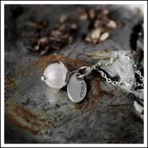 Paird pearl necklaces
