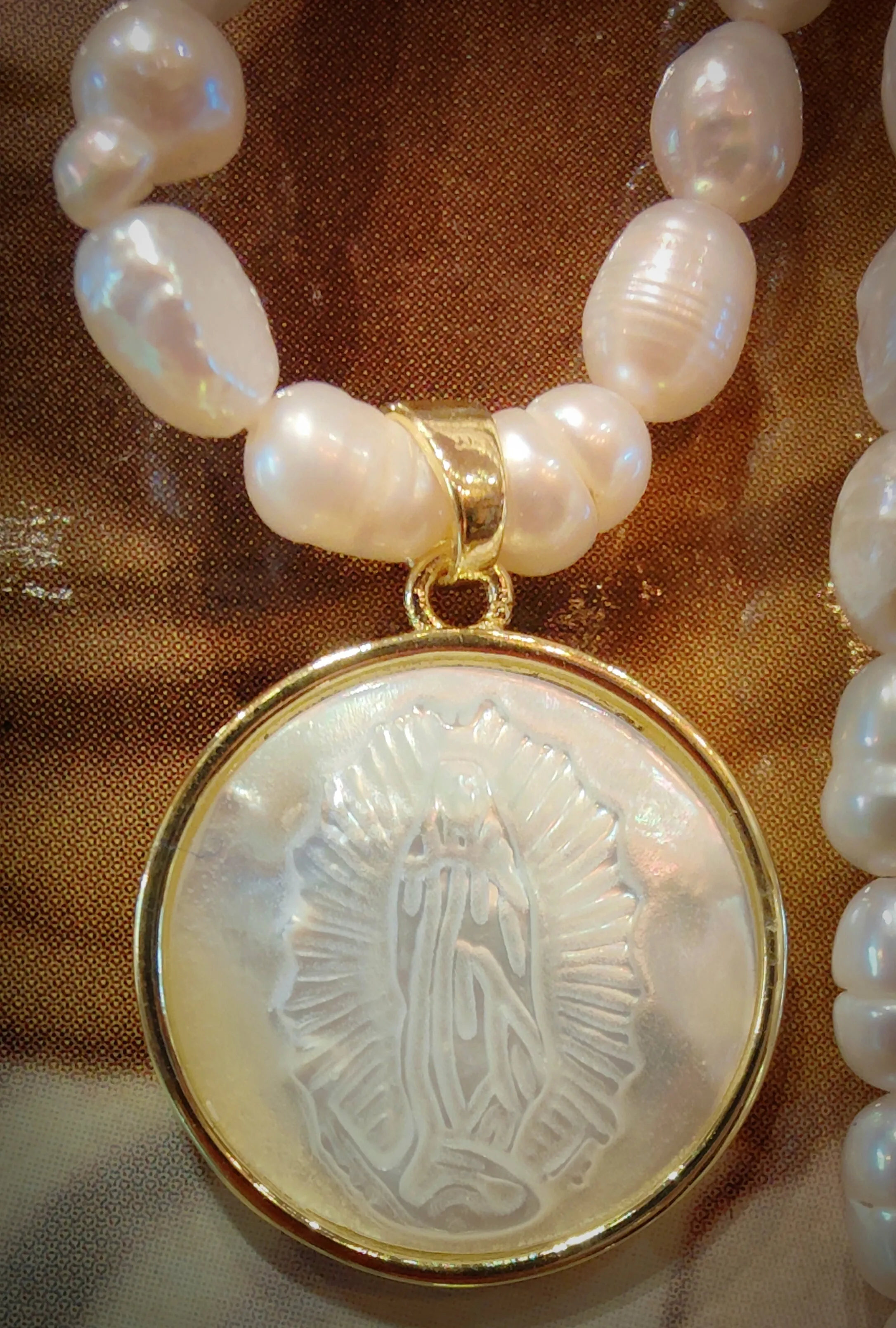 Pearl Virgin necklaces