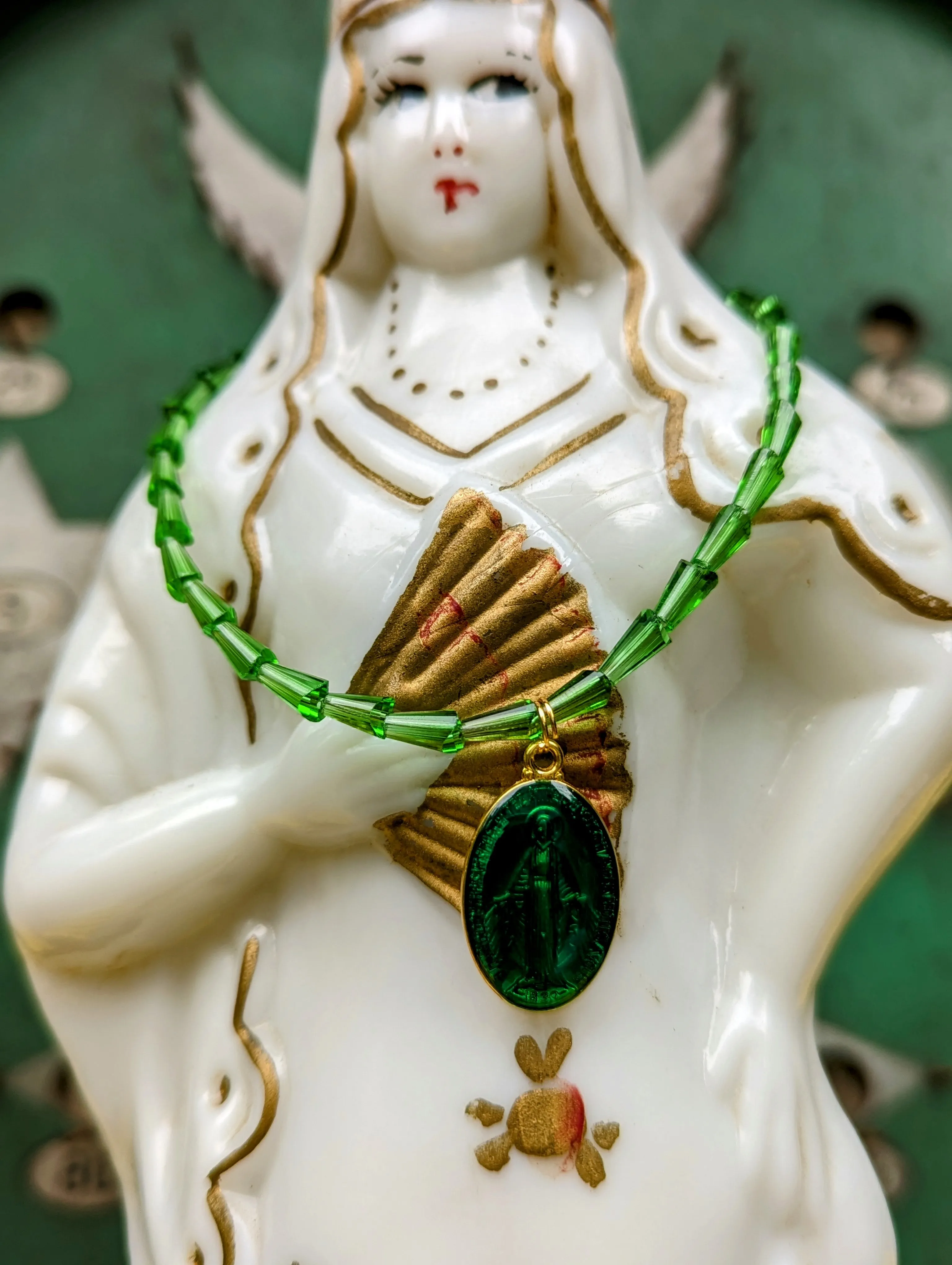 Sacred Mary enamel pendants on Conical crystal necklaces